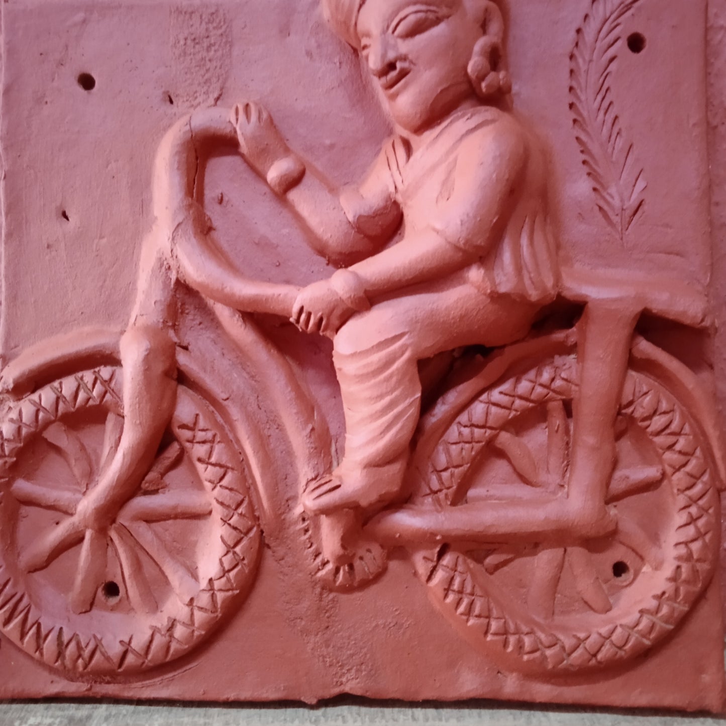 Terracotta Man on bicycle