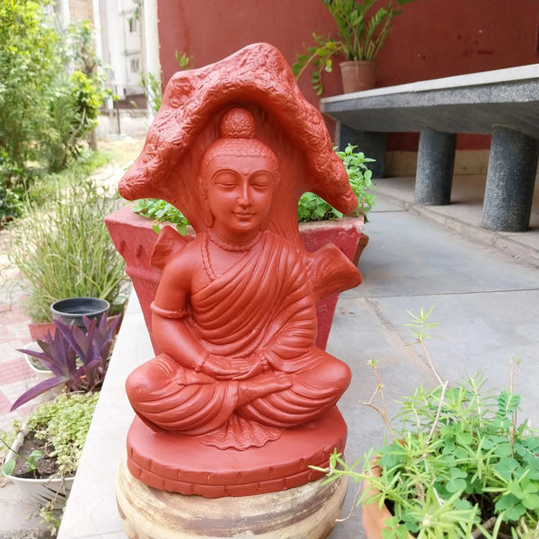 Meditative buddha under a tree terracotta statue 